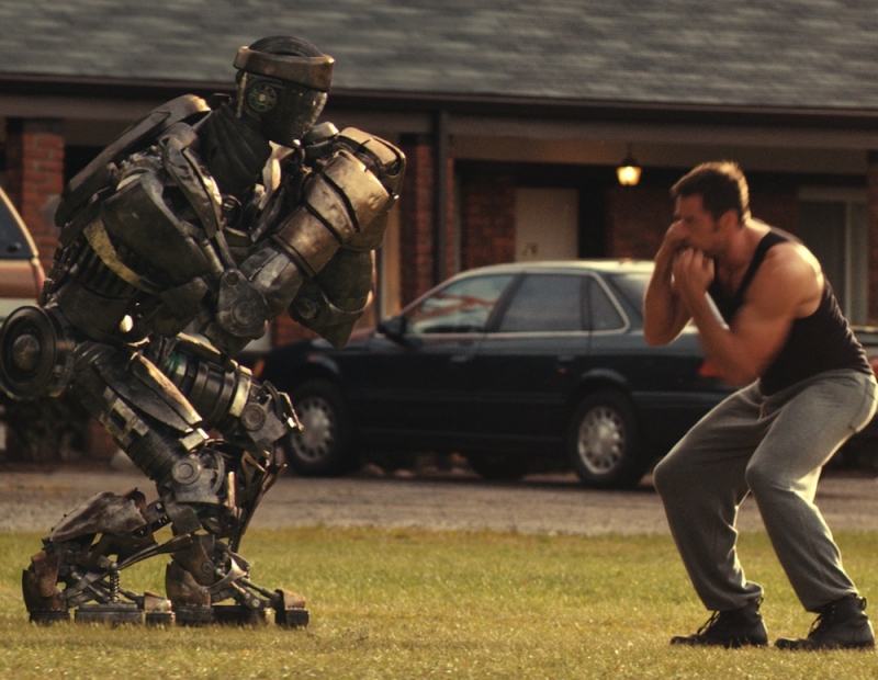 Hugh-Jackman-with-star-robot-Atom-in-Real-Steel.jpg
